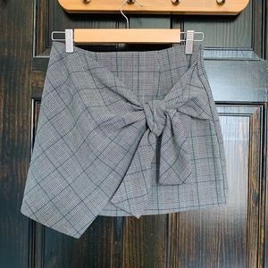 Plaid tie front mini skirt